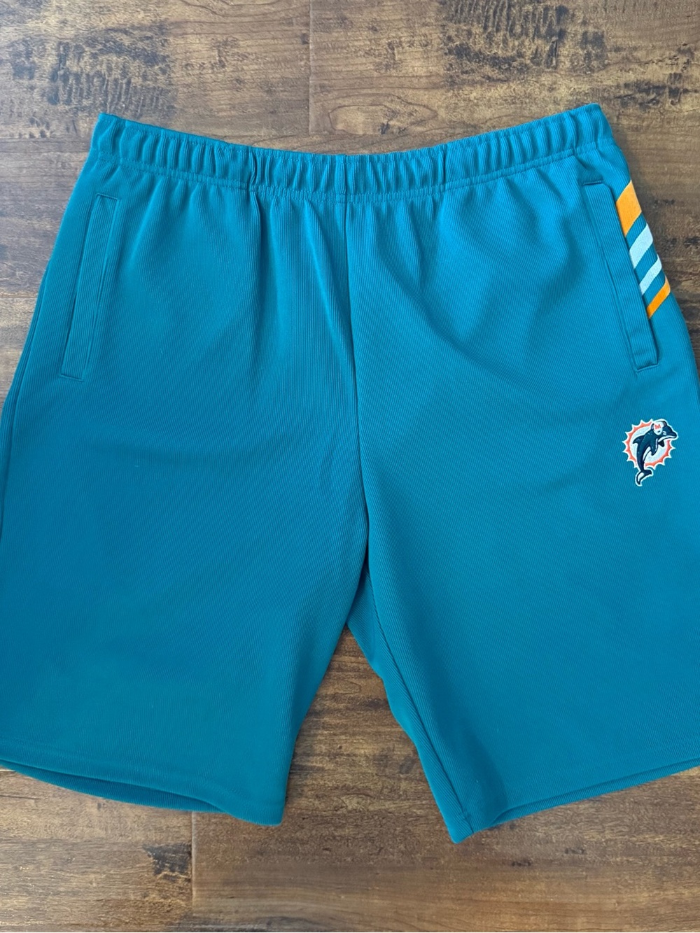 NFL Teal Training Shorts with Dolphins Logo and Stripe Accents